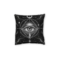Cushion artwork: A finely drawn eye radiates light from the centre of overlapping circles and triangles, with a teardrop suspended below.