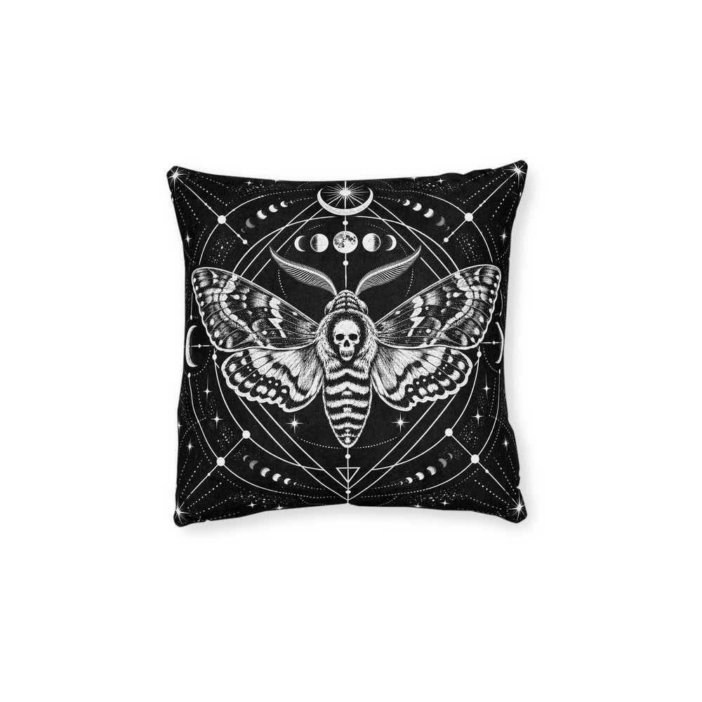Cushion artwork: A death's-head-style moth spreads richly patterned wings beneath a row of moon phases, with a skull motif at the centre of its body.