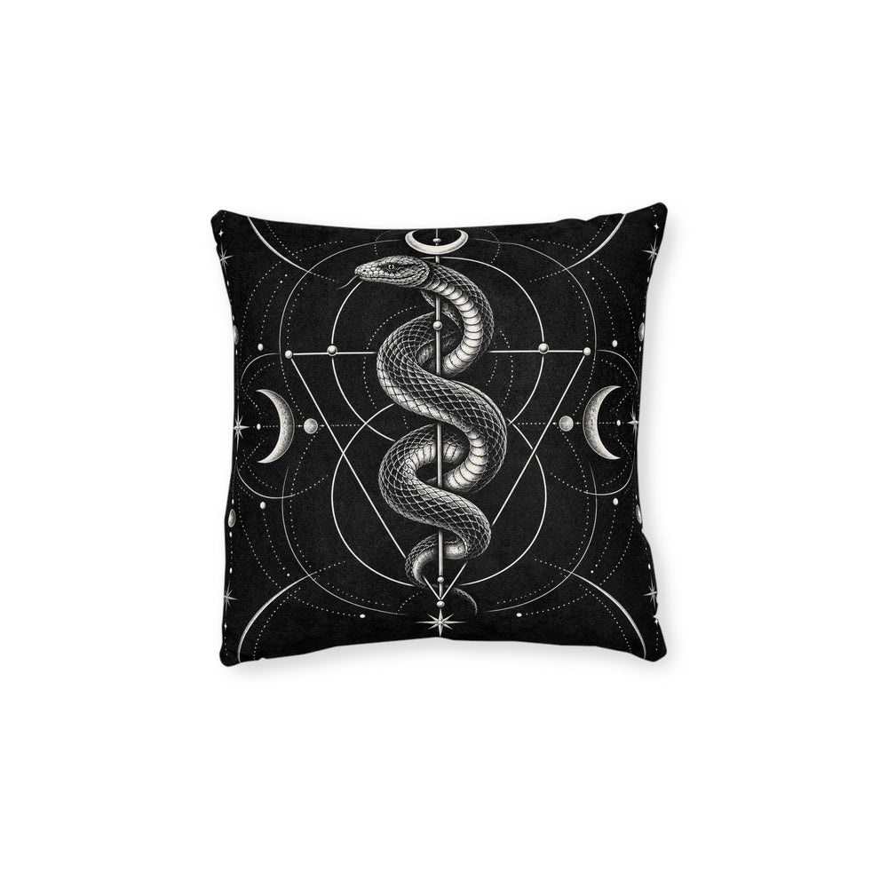 Cushion artwork: A detailed serpent coils around a slender vertical axis beneath a crescent moon, its head raised above the looping body.