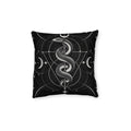 Cushion artwork: A detailed serpent coils around a slender vertical axis beneath a crescent moon, its head raised above the looping body.