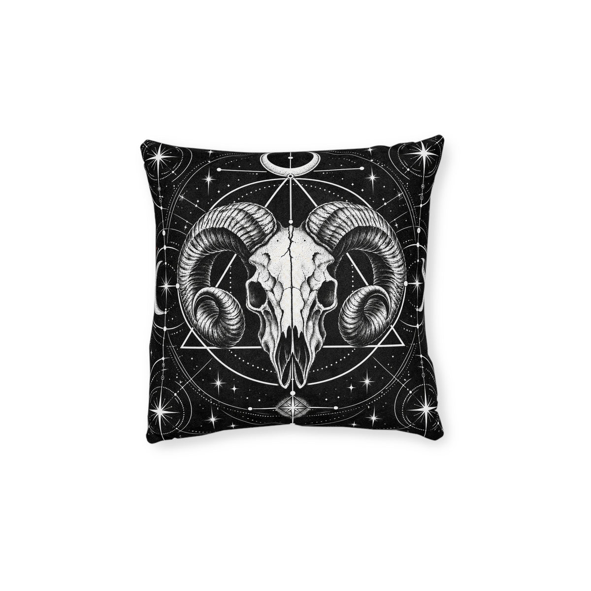 Cushion artwork: A ram skull faces forward with deeply curled horns, surrounded by intersecting circles, triangles and starbursts.