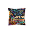 Cushion artwork: A vast whale swims through a sky full of stars, planets and bright cosmic currents above an equally colourful alien landscape.